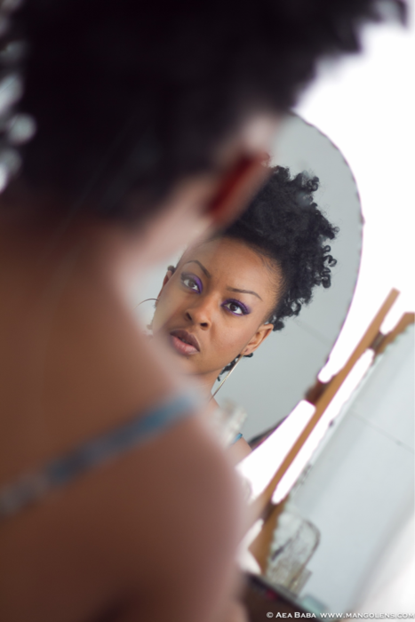 black woman in mirror